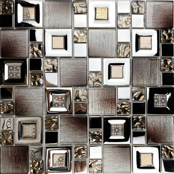 Mixed materials mosaic tile, a combination of shimmer foil glass tile, electroplated glass decorative pieces and stainless steel tile. #wall tile, #bathroom tile, #kitchen tile, #backsplash tile, #accent wall tile. Impressively durable and easy to clean. This series of mixed materials mosaic  tiles are made by Xmosaics Foshan factory, your reliable mosaic tile manufacturer, supplier and exporter.